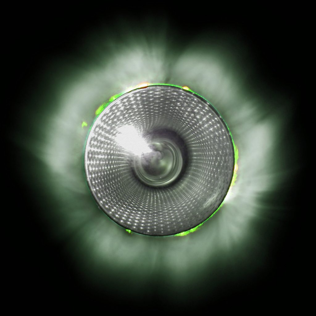Scientific illustration - well, a photograph, really - of plasma forming around a vacuum tube, by BentaxGermany