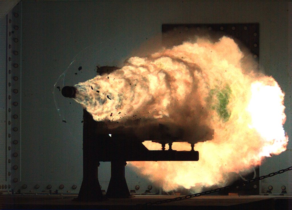 scientific illustration of a railgun projectile fired during a US Navy test run.