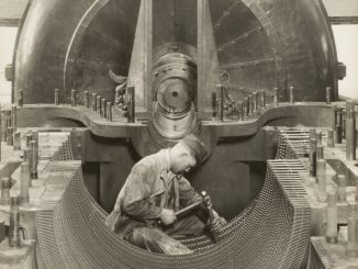 Scientific illustration of a worker manufacturing (or repairing) a gigantic Westinghouse engine (or generator).