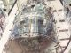 Scientific illustration of the Hubble Space Telescope being loaded into the gleaming VPF.