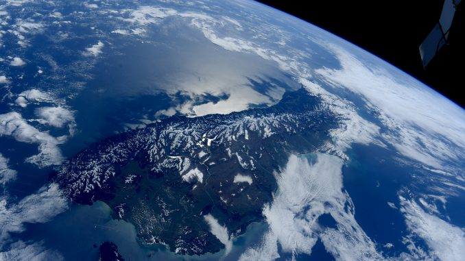 Scientific illustration of the Earth in the form of a photograph of New Zealand by the International Space Station's Samantha Cristoforetti.