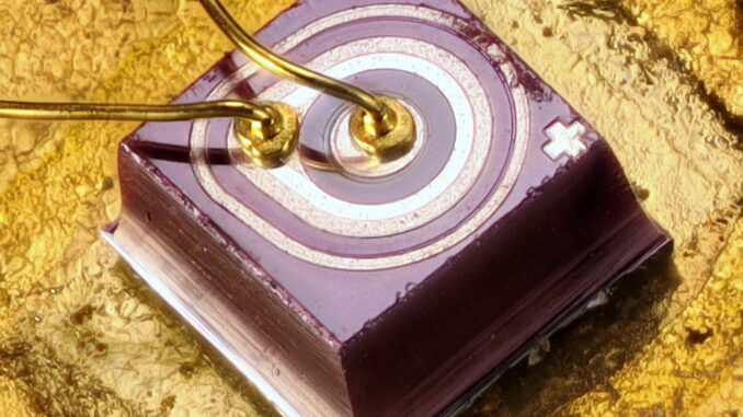 Scientific illustration of an electronic component, a photograph of a transistor enlarged.
