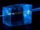 Scientific illustration by Jan Pavelka showing a blue laser creating a fluorescent glow inside a cube of calcite.