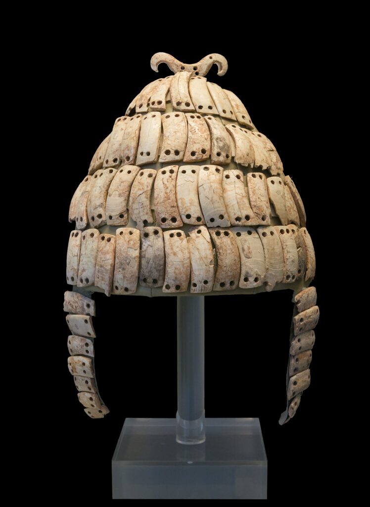 Scientific illustration of an ancient Greek helmet.