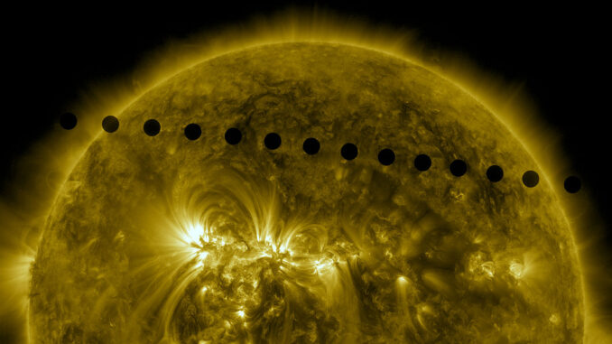 Scientific illustration of Venus transiting in front of the Sun, as captured by the Solar Dynamics Observetory satellite, a flaming metallic orb girdled by a series of perfectly circular silhouettes making a diagonal line from the upper left to the middle right of the image.