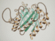 Scientific illustration of the coiled spirals and twisting arrows of a molecular diagram, hand drawn and colored.