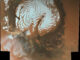 Scientific illustration of the North Pole of Mars, as photographed by a Chinese space probe, looking like a nautilus shell.