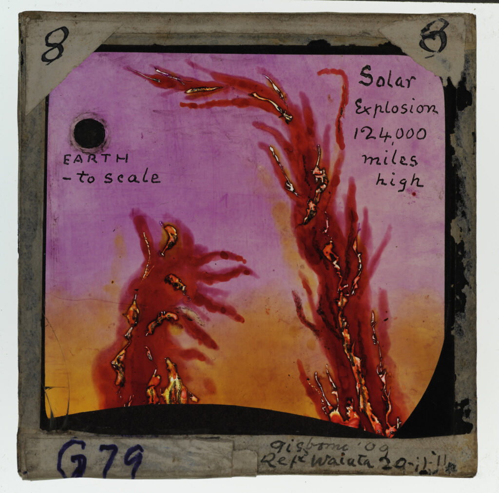 Scientific illustration of solar flares with the Earth to scale, showing how big they are compared to our planet. Orange fronds reaching across a pale purple void toward a small, dark ball.