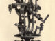 Scientific illustration of 19th century apparatus, gears and wheels and tubes, for determining altitude and azimuth. It's all very complicated.