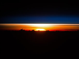 Scientific illustration of a sunrise seen from space, snapped by the astronauts aboard the International Space station orbiting over Vietnam.