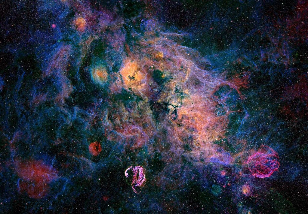 Scientific illustration of brilliantly colored nebulae in the depths of space.