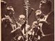 Scientific illustration of musicians playing jazz and an audio waveform; part of a 1960s ad for professional audio tape from Ampex.